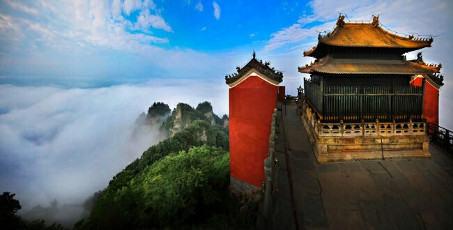the image shows golden palace on top of the wudang mountain