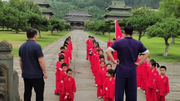 iamge shows students lining up inside the academy