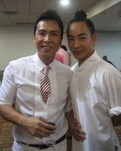 image shows actor Donnie Yen with wudang master qingfengzi